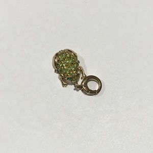 Fossil green frog charm